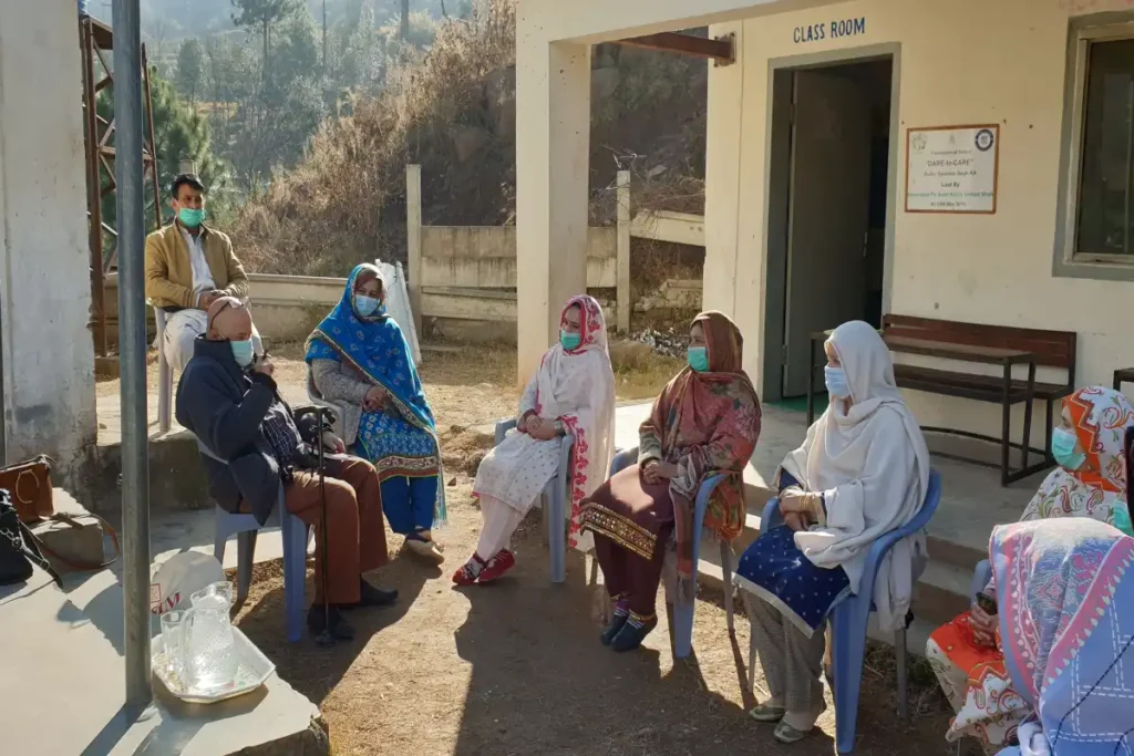 Small group discussion during an inclusive education training course.